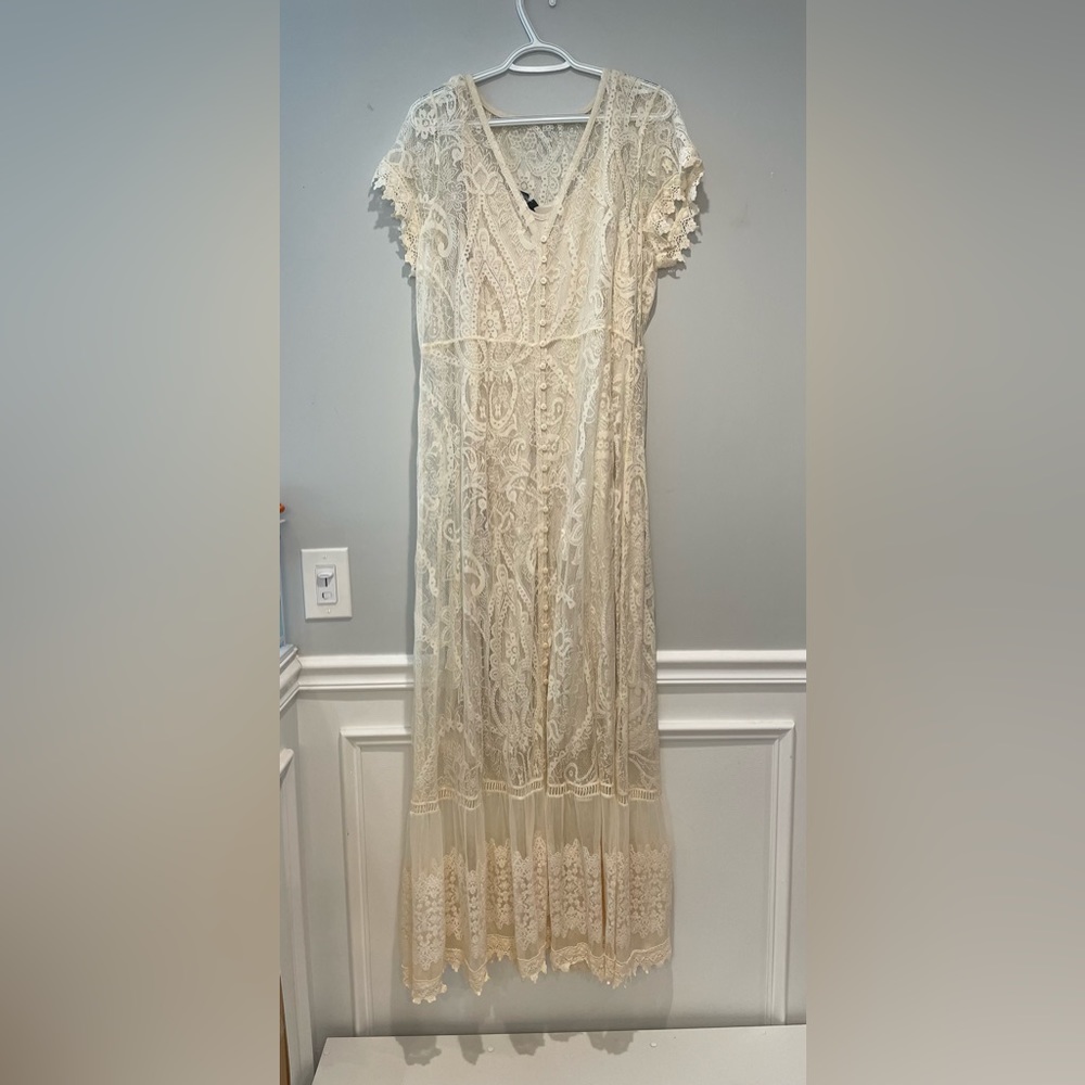 Ivory/cream Torrid maxi dress with midi underlay.